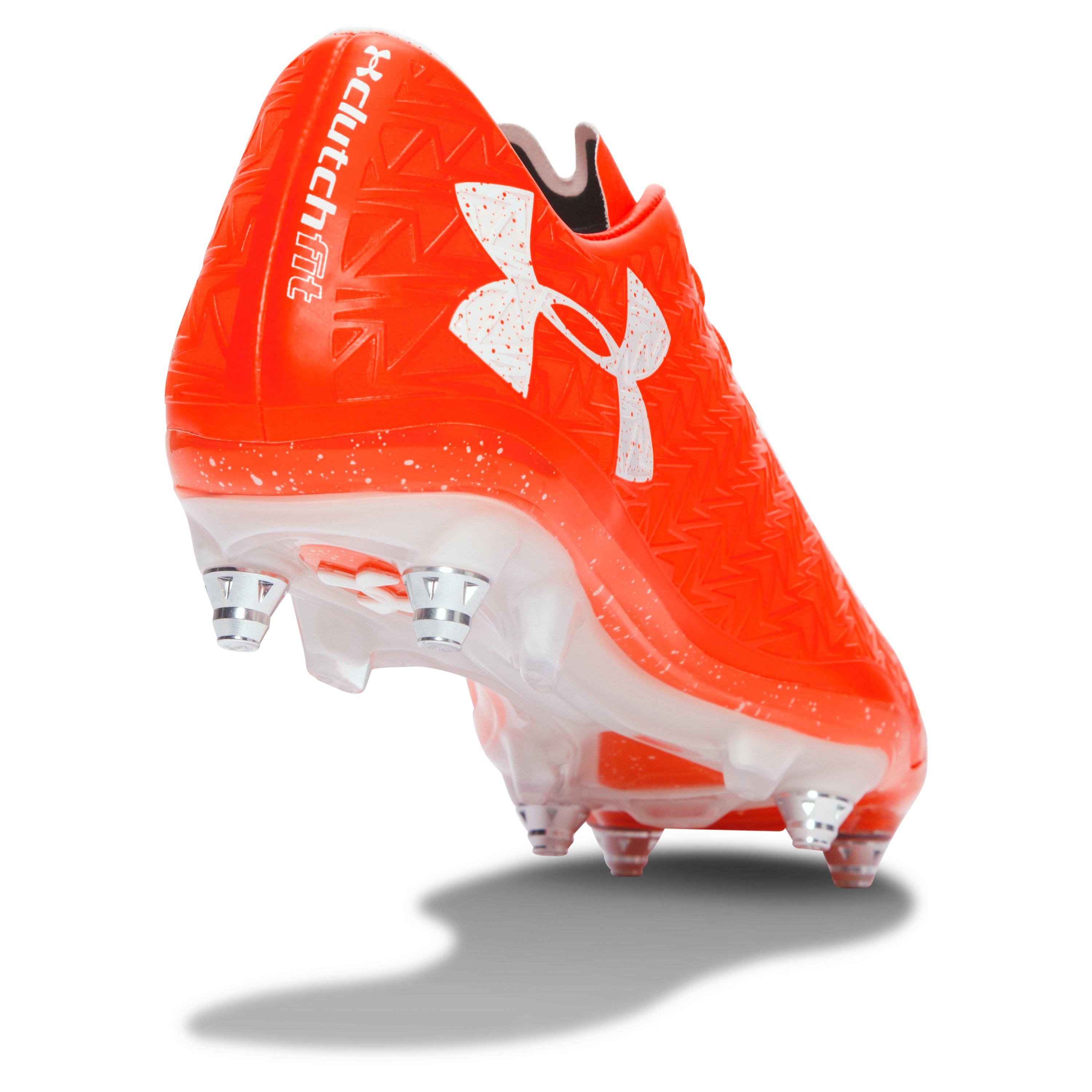 orange under armour baseball cleats